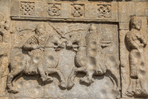 Men on Horseback carvings, front of Lion column, Basilica of San Zen